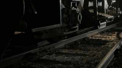 [train brakes squealing] - Escape from Germany