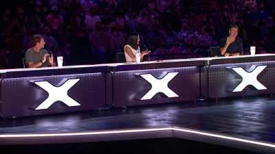 - Travis actually can't vote,
but I'm a mind reader. - America's Got Talent: Extreme