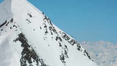 Trending skiers left
along this ridge line, - Edge of the Earth