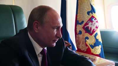 (triumphant, patriotic
music continuing) - The Putin Interviews