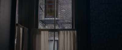 [trumpet playing in distance] - The Woman in the Window