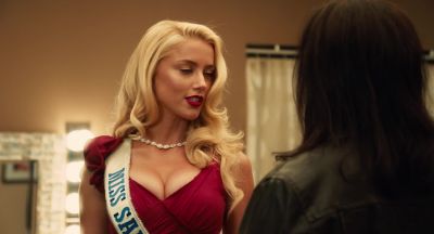 Try not to be distracted by the cleavage and the hairspray - Machete Kills
