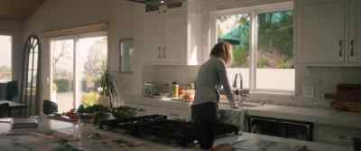 [TV blares in the background] - Homestead