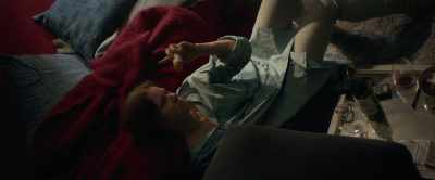 [TV chatter continues indistinctly] - The Woman in the Window