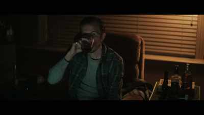 [TV continues, indistinct] - Grotesquerie
