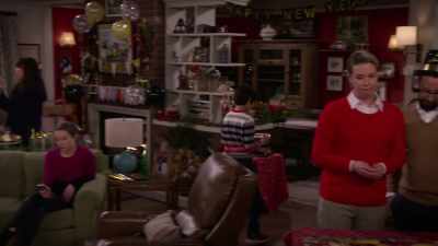 [TV playing indistinctly] - Merry Happy Whatever