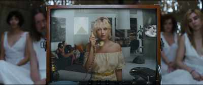 (TV PLAYING) - Under the Silver Lake