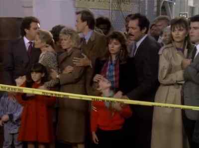 [TV REPORTER]
WE'VE LEARNED THAT
A LOCAL ARCHITECT, - A Very Brady Christmas
