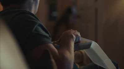 (TV sportscast playing
indistinctly) - High Maintenance