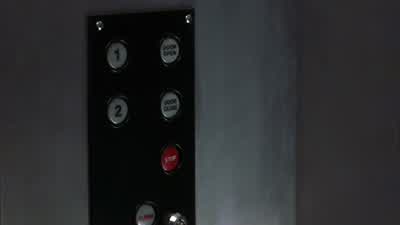 Two buttons. - Smallville