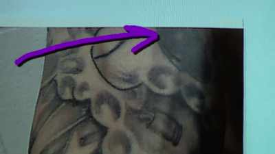 Two front views of
a semi-automatic handgun, - Killer Inside: The Mind of Aaron Hernandez