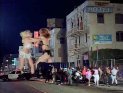 Two giant women, we need reinforcements, immediately. - Attack of the 60 Foot Centerfold