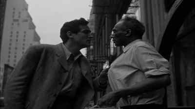 - U.N. The U.N.
- What's that? - The Glass Wall