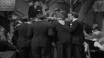 - Uh, who gave you this?
- The lady over there. - Another Thin Man