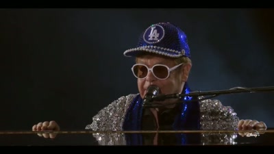 Um, and I'd also like
to introduce somebody - Elton John Live: Farewell from Dodger Stadium