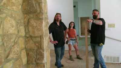Um, they love the stone.
They hate the color. - Renovation Impossible