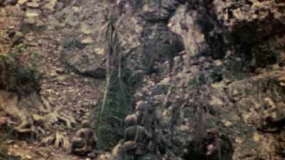 UP THE UNFORGIVING TERRAIN
AND THROUGH UNRELENTING FIRE. - The Pacific War in Color