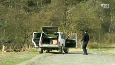 (UPBEAT MUSIC BLARES
OVER CAR STEREO) - From Russia to Iran: Crossing Wild Frontier