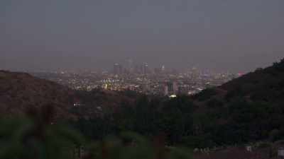 [upbeat music playing] - Buying Beverly Hills
