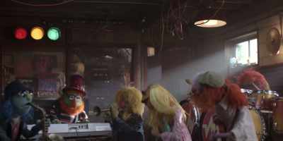 - (UPBEAT MUSIC PLAYING)
- (SINGING) - The Muppets Mayhem
