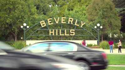[upbeat song playing] - Buying Beverly Hills