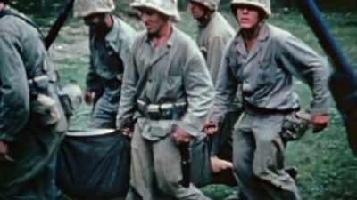US forces find themselves pinned
down by unrelenting fire. - The Pacific War in Color