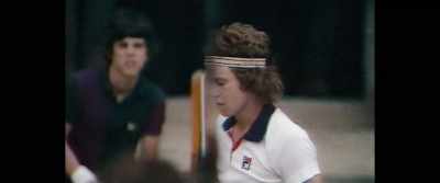 US PRESENTER:
England's Wimbledon tennis tournament - McEnroe