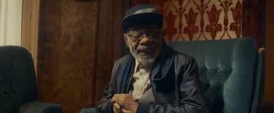 Usava uma gravata bem tricotada. - Rudeboy: The Story of Trojan Records