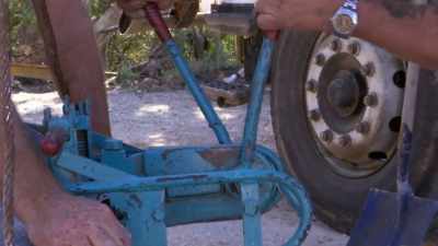Using a massive stapler,
steel staples clip the belt together. - Outback Opal Hunters