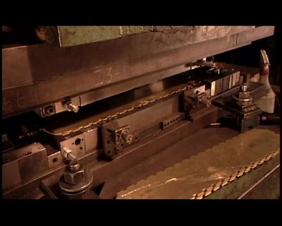 USING A PRESS,
THEY BEND EACH HEADER. - How It's Made