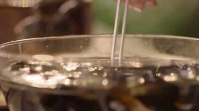 Using a spider, just a wire mesh ladle,
I'm just going to add them to the pan. - Nigella: At My Table