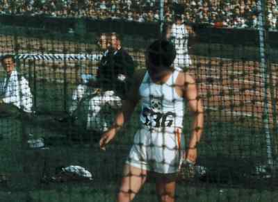 Very despondently, Gang-Hwan Gin
makes way for the next competitor. - XIVth Olympiad: The Glory of Sport