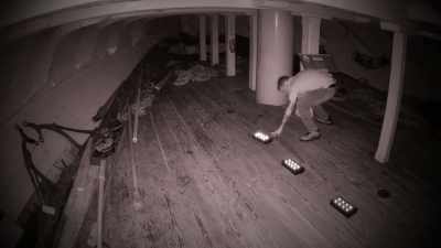 ...Violently grabbed him
by the arm. - The Holzer Files