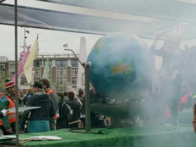 VOICE-OVER: 9 Dam Square, - Occupied City