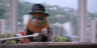 (VOICE SLOWS DOWN AND REPEATS) - The Muppets Mayhem