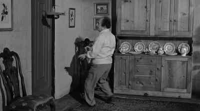 Wait a minute, I've got to open the door. - The Three Stooges in Orbit