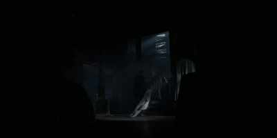 Waiting outside
with her hand on the door? - Batwoman