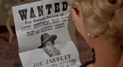 Wanted for 16 counts of larceny - 4 for Texas