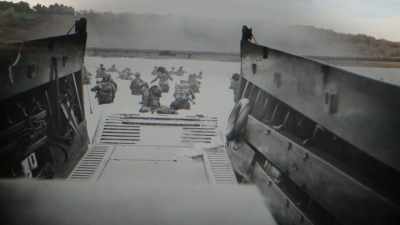 Wave after wave of infantry
arrive in Omaha's killing zone. - World War II: Secrets from Above