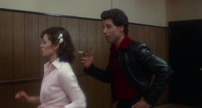 We both got the same last initials How do you like that - Saturday Night Fever