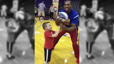 WE COMMUNICATE THROUGH SMILES,
COMMUNICATE THROUGH HUGS, AND, - Harlem Globetrotters: Play It Forward