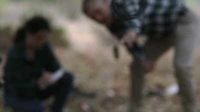 We had found
a pair of handcuffs hanging
from a tree limb. - Buried In The Backyard