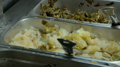 We got me some mac and cheese,
greens, cabbage, wings, - Searching for Soul Food