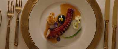We have grilled and smoked octopus
along with some caramelized lemon, - Triangle of Sadness
