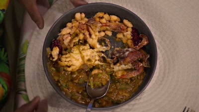We have the gumbo, then crab on top. - Cook at all Costs