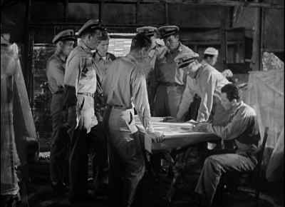 We haven't got enough
steel helmets to go around... - They Were Expendable