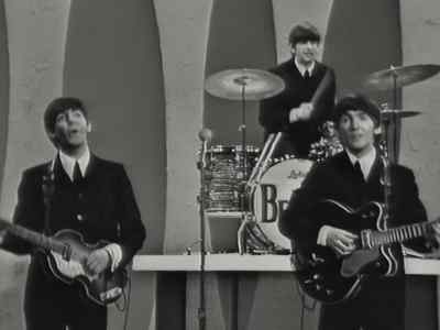 We heard
it was a group in England, - Beatles '64