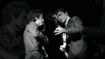 We play with him
and they boo us every night. - Once Were Brothers
