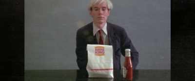 We see Andy in front of
this very ordinary table, - Andy Warhol's America
