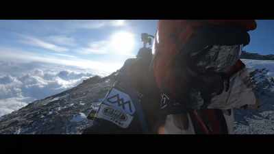 We summitted around
6:00 p.m. the next day. - 14 Peaks: Nothing Is Impossible